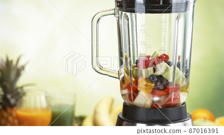 Fresh fruit and vegetables smoothie blended in blender Fresh fruit and vegetables smoothie blended in blender 87016391