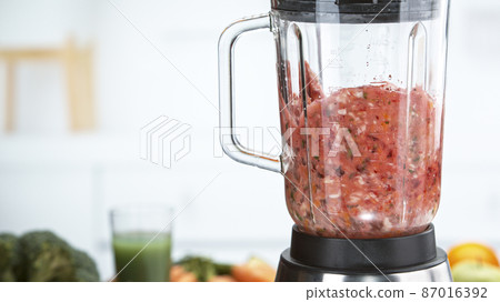 Fresh fruit and vegetables smoothie blended in blender Fresh fruit and vegetables smoothie blended in blender 87016392