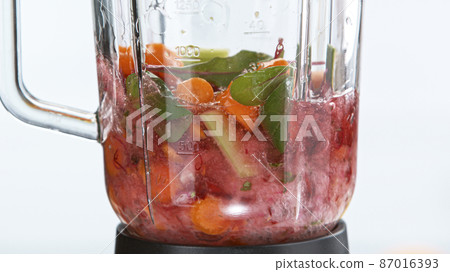 Fresh fruit and vegetables smoothie blended in blender Fresh fruit and vegetables smoothie blended in blender 87016393