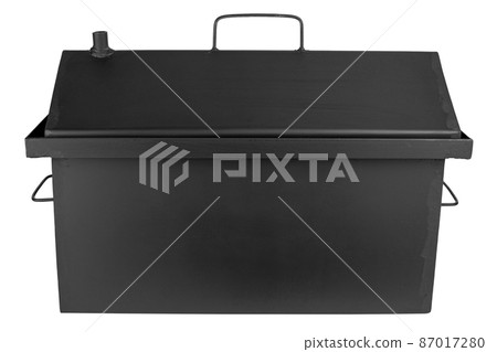 Metal smokehouse made of black iron isolated with white background. Smoking meat and fish. 87017280