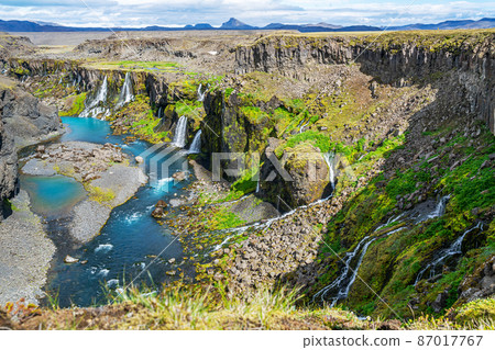 Summer view of waterfalls in Sigoldugljufur canyon. Summer view of waterfalls in Sigoldugljufur canyon. 87017767