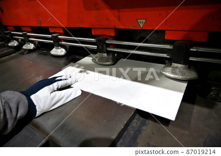 Male worker working in shirring Manufacturing shear machine Male worker working in shirring Manufacturing shear machine 87019214