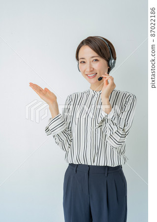 Business operator headset hand holding 87022186