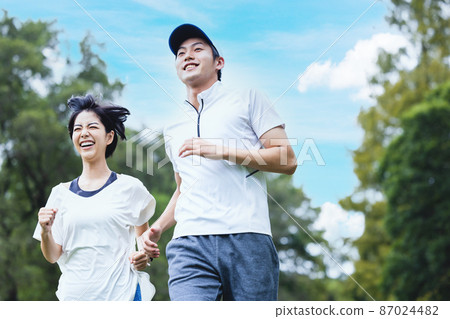 Jogging couple Jogging couple 87024482