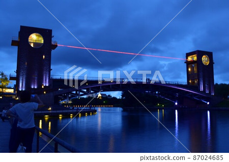 Twilight illuminated canal bridge Twilight illuminated canal bridge 87024685