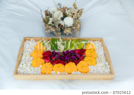 Thai wedding ceremony concept. Flower on honeymoon bed is a part of bride price in Thai wedding Thai wedding ceremony concept. Flower on honeymoon bed is a part of bride price in Thai wedding 87025612