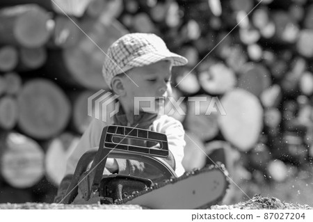 Beautiful baby boy with child face posing photographer 87027204