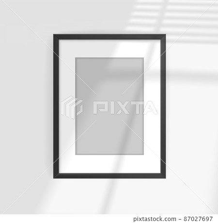 Photo frame mockup with sun flare effect. Light of the window with blinds Photo frame mockup with sun flare effect. Light of the window with blinds 87027697