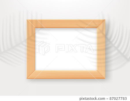 Empty wood frame on the table with palm leaves shadows. 3d vector mockup for design Empty wood frame on the table with palm leaves shadows. 3d vector mockup for design 87027783