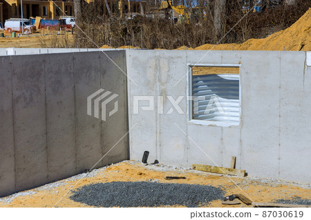 A newly completed cement foundation of a new housing development A newly completed cement foundation of a new housing development 87030619