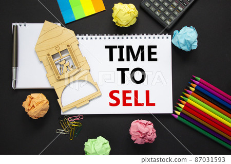 Time to rent sell estate symbol. White note, words 'time to sell' on beautiful black background, metalic pen, calculator, colored pencils, miniature house. Business, time to sell real estate concept. 87031593