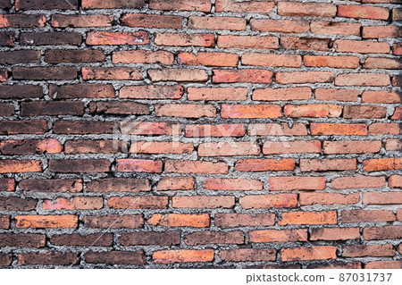 Concrete and red brick wall. 87031737