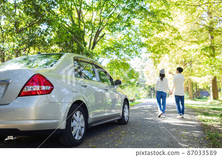 Young men and women enjoying a drive date Young men and women enjoying a drive date 87033589
