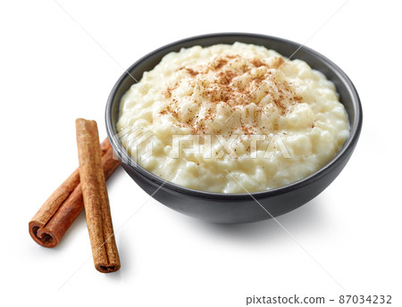 bowl of rice and milk pudding 87034232