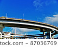 Tokyo Rainbow Bridge seen from the coast of Minato-ku, Tokyo 87036769