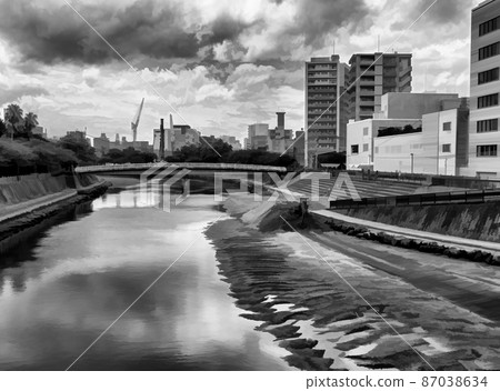 View along a river in the center of Kagoshima city, Japan, in black and white. 87038634