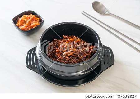 Korean black spaghetti or instant noodle with roasted chajung sauce Korean black spaghetti or instant noodle with roasted chajung sauce 87038827