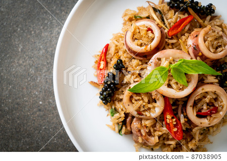 Basil and Spicy Herb Fried Rice with Squid or Octopus Basil and Spicy Herb Fried Rice with Squid or Octopus 87038905