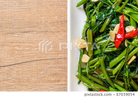 Stir-Fried Chinese Morning Glory or Water Spinach Stir-Fried Chinese Morning Glory or Water Spinach 87039054