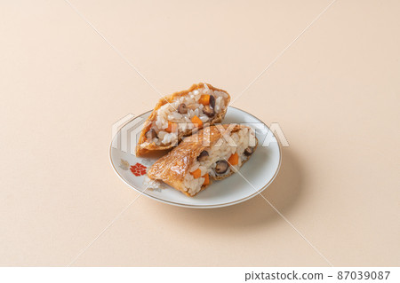 sushi rice wrapped in dried tofu 87039087