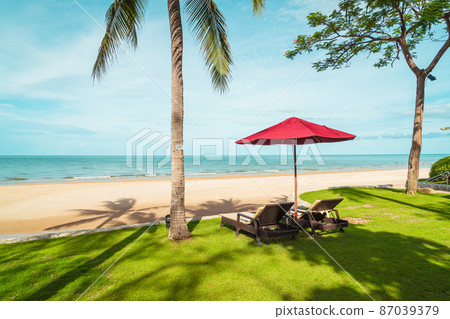 Umbrella and chair with sea ocean view in hotel resort Umbrella and chair with sea ocean view in hotel resort 87039379