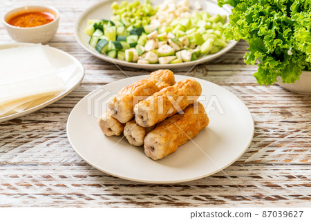 Vietnamese pork  meatball with vegetables wraps (Nam-Neaung or Nham Due) 87039627
