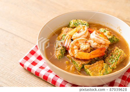 Sour soup made of Tamarind Paste with Shrimps and Vegetable Omelet 87039628