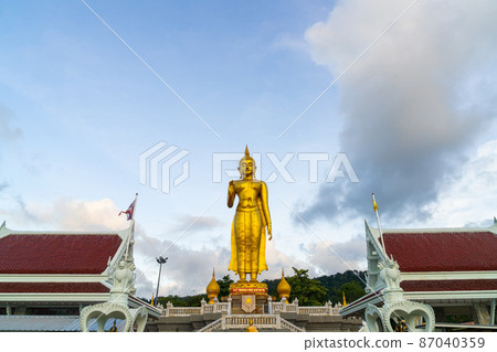 A golden buddha statue on the mountain top at Hat Yai municipality public park, Songkhla Province, Thailand 87040359