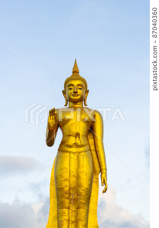 A golden buddha statue on the mountain top at Hat Yai municipality public park, Songkhla Province, Thailand 87040360
