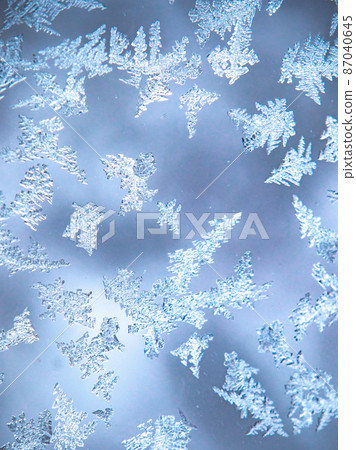 Frost crystals on the window glass Zao 87040645