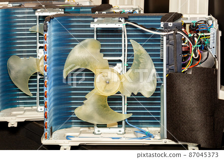 Closeup cross section of the interior of an air conditioner condenser. Closeup cross section of the interior of an air conditioner condenser. 87045373