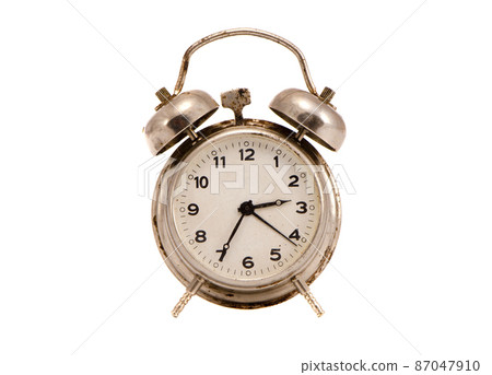 isolated and grungy vintage metal clock 87047910