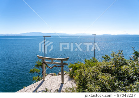 Torii of the dragon shrine famous for Kawarake-nage on Chikubu Island, Lake Biwa, Nagahama City, Shiga Prefecture Torii of the dragon shrine famous for Kawarake-nage on Chikubu Island, Lake Biwa, Nagahama City, Shiga Prefecture 87048227