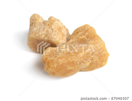 Asafoetida, also spelled asafetida. Isolated on white background 87048307