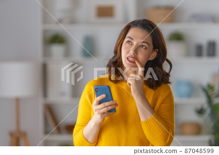 woman is using phone woman is using phone 87048599