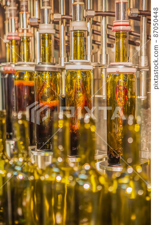 Rows of wine barrels in vaults at the winery. 87050448