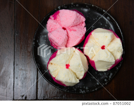 The Chinese fluffy rice flour cake on wood table for celebration day 87051002