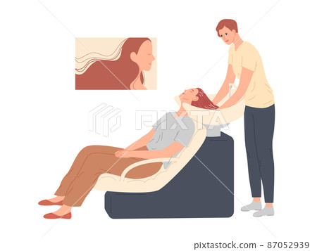 The hairdresser washes her client s hair in preparation for the haircut The hairdresser washes her client s hair in preparation for the haircut 87052939