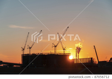 Construction site at dusk 87056712