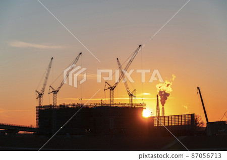 Construction site at dusk 87056713