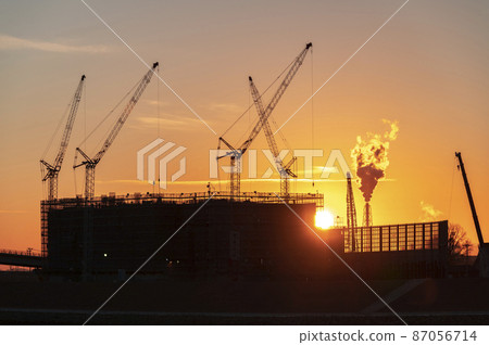 Construction site at dusk 87056714