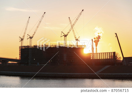 Construction site at dusk 87056715