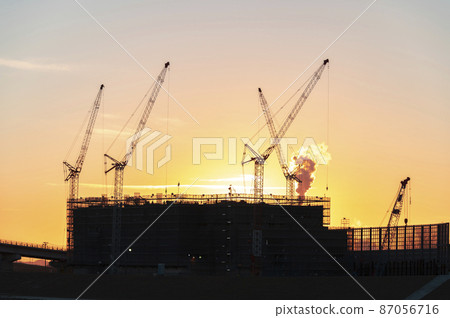 Construction site at dusk 87056716