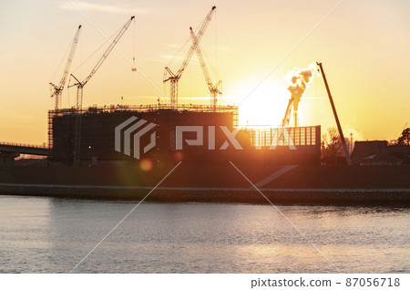 Construction site at dusk 87056718