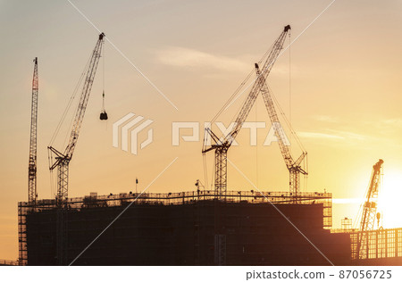 Construction site at dusk 87056725