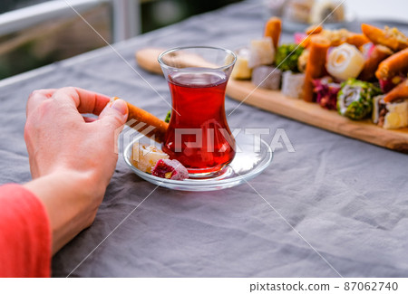Traditional tea with locum sweets Turkish delight. Traditional tea with locum sweets Turkish delight. 87062740