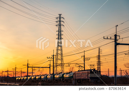 "Saitama Prefecture" Musashino Line / freight train running in the setting sun 87063614