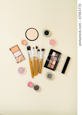Group of cosmetic and makeup products on studio background Group of cosmetic and makeup products on studio background 87063778
