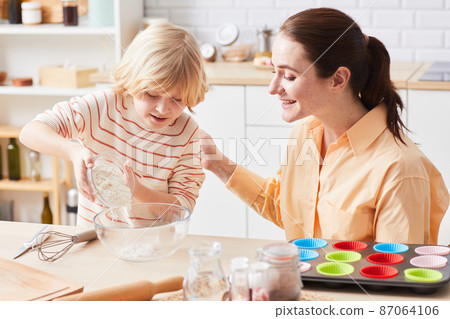 Mother and Son Baking Together 87064106