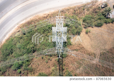 Transmission tower or pylon in aerial view. Transmission tower or pylon in aerial view. 87065630